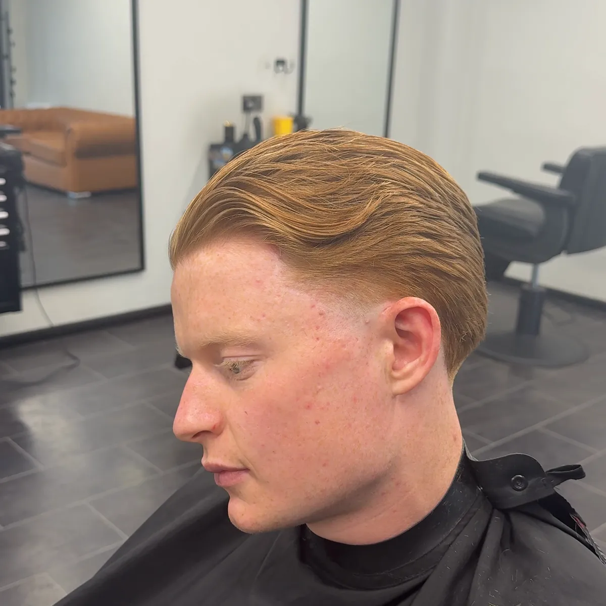 Side part with a soft taper